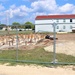 Work to build new foundations for relocated World War II-era barracks under way at Fort McCoy