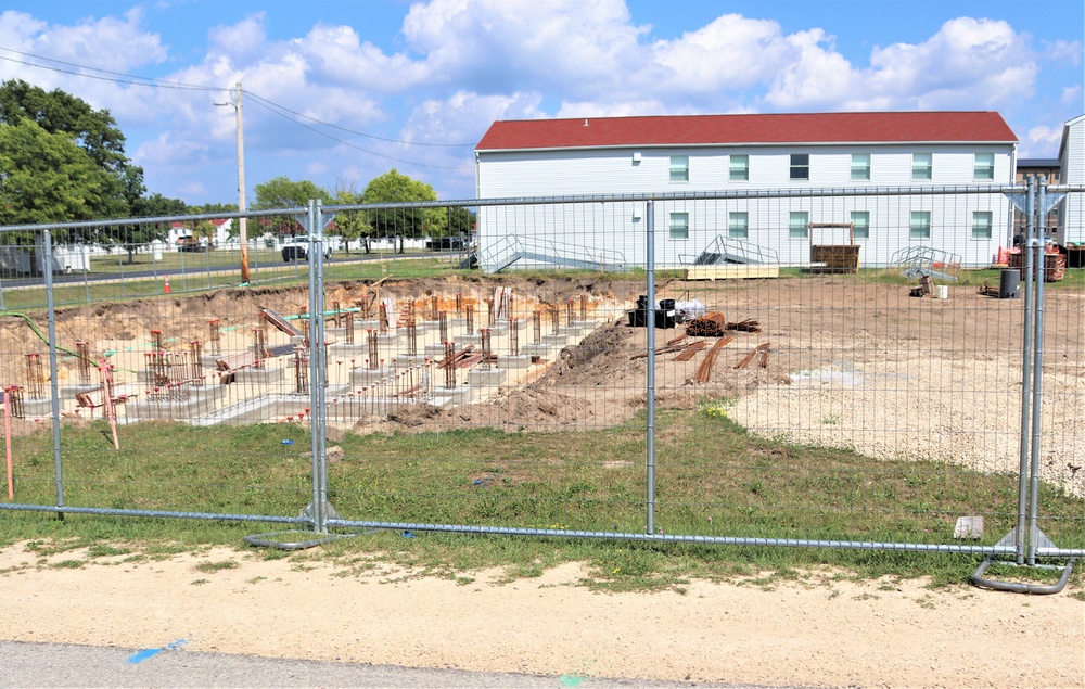 Work to build new foundations for relocated World War II-era barracks under way at Fort McCoy