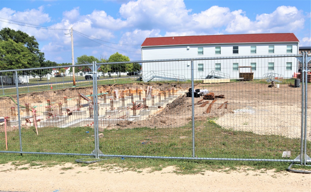 Work to build new foundations for relocated World War II-era barracks under way at Fort McCoy