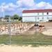 Work to build new foundations for relocated World War II-era barracks under way at Fort McCoy