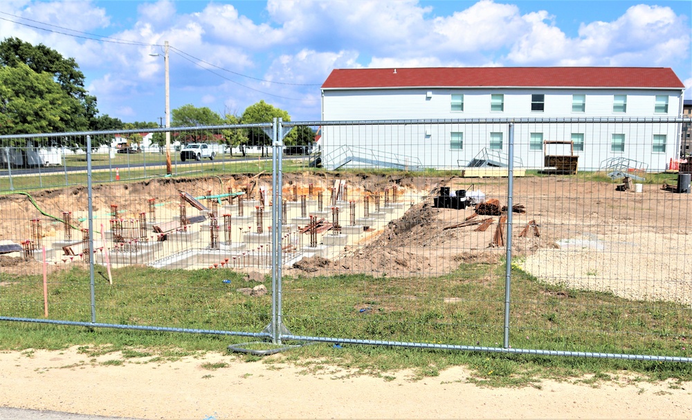 Work to build new foundations for relocated World War II-era barracks under way at Fort McCoy