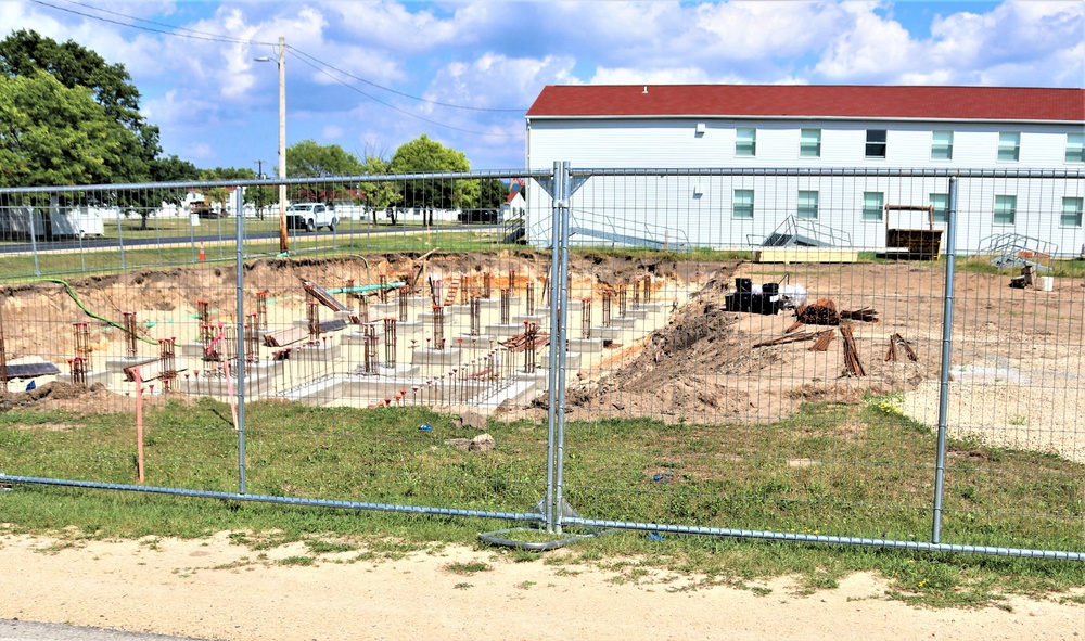 Work to build new foundations for relocated World War II-era barracks under way at Fort McCoy