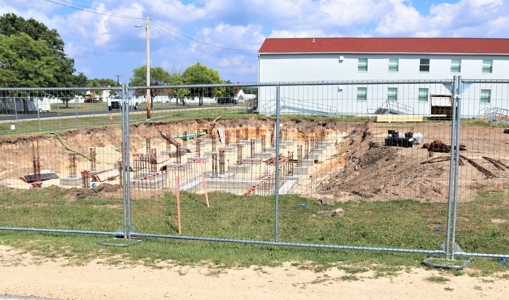 Work to build new foundations for relocated World War II-era barracks under way at Fort McCoy