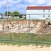 Work to build new foundations for relocated World War II-era barracks under way at Fort McCoy