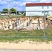 Work to build new foundations for relocated World War II-era barracks under way at Fort McCoy