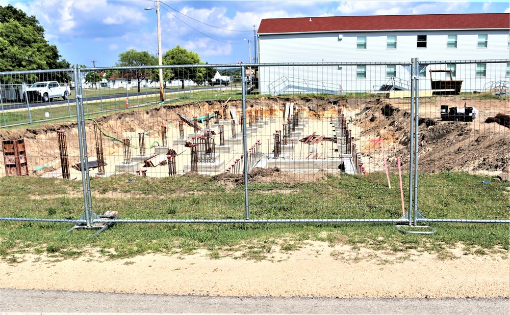 Work to build new foundations for relocated World War II-era barracks under way at Fort McCoy