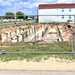 Work to build new foundations for relocated World War II-era barracks under way at Fort McCoy