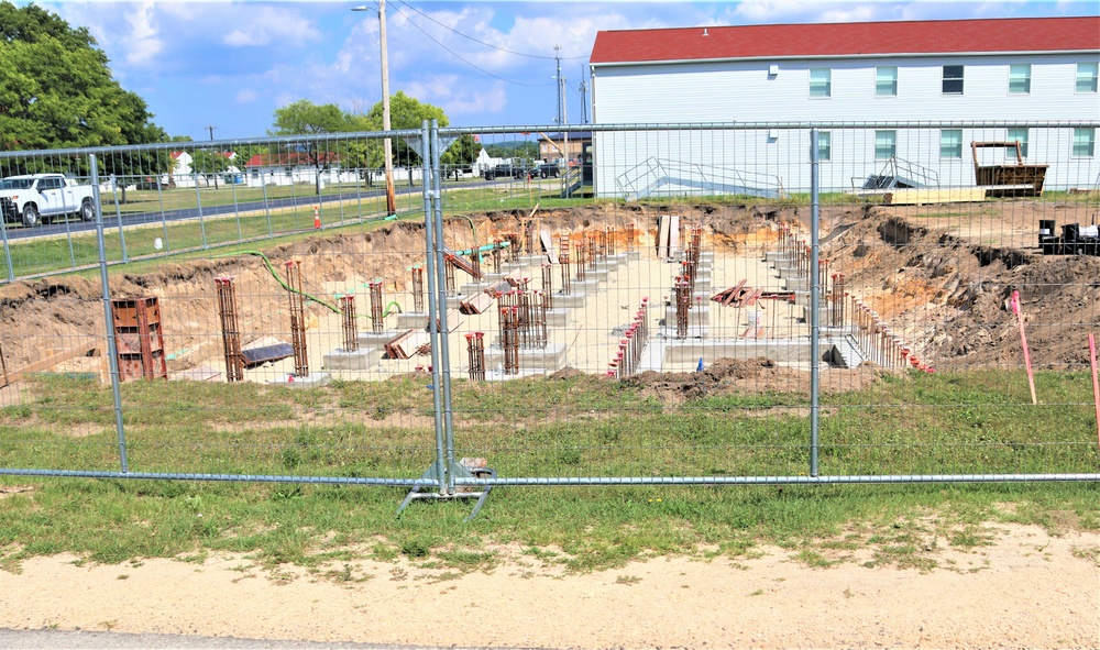 Work to build new foundations for relocated World War II-era barracks under way at Fort McCoy