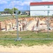 Work to build new foundations for relocated World War II-era barracks under way at Fort McCoy