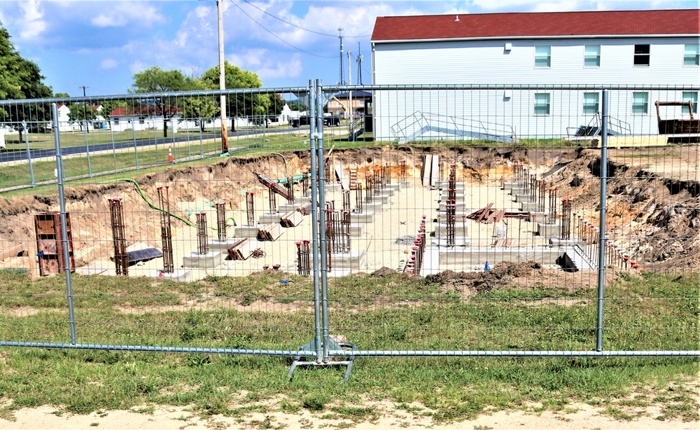 Work to build new foundations for relocated World War II-era barracks under way at Fort McCoy