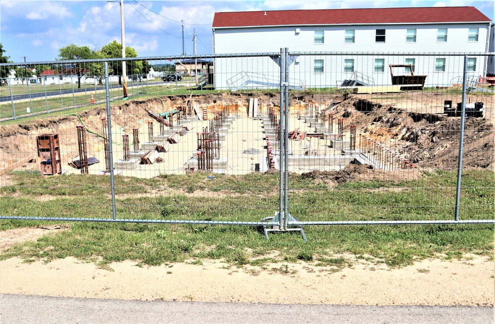 Work to build new foundations for relocated World War II-era barracks under way at Fort McCoy