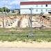 Work to build new foundations for relocated World War II-era barracks under way at Fort McCoy