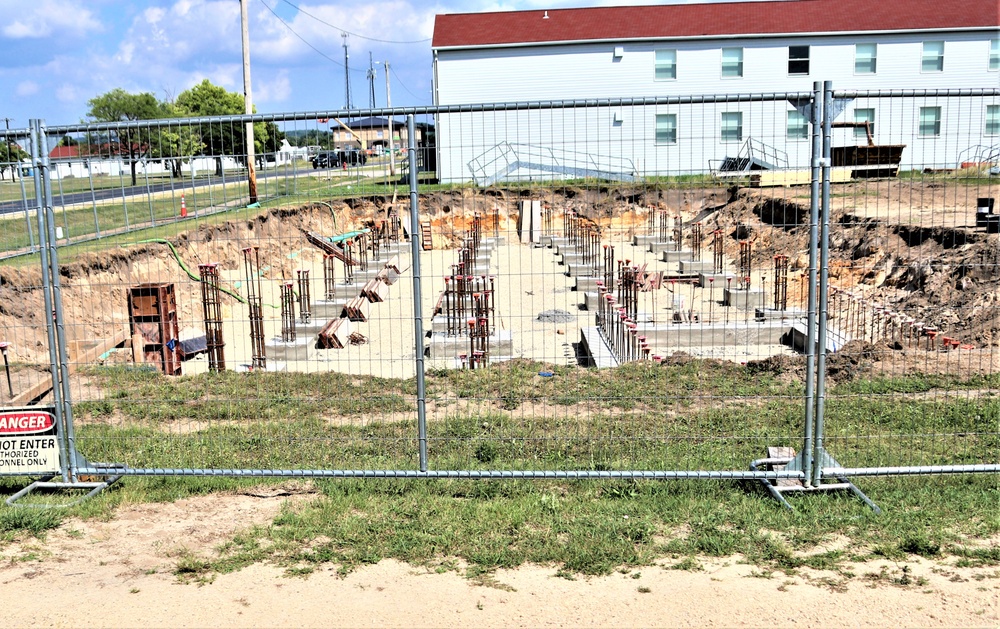 Work to build new foundations for relocated World War II-era barracks under way at Fort McCoy