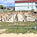 Work to build new foundations for relocated World War II-era barracks under way at Fort McCoy