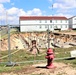 Work to build new foundations for relocated World War II-era barracks under way at Fort McCoy