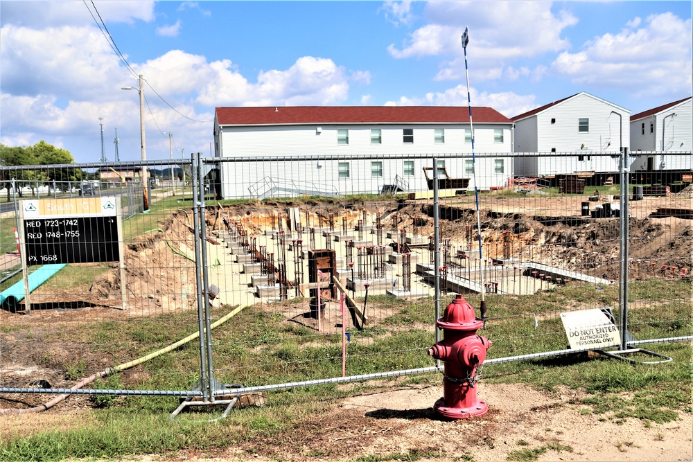 Work to build new foundations for relocated World War II-era barracks under way at Fort McCoy