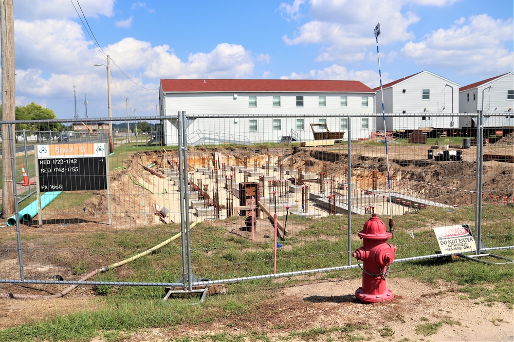 Work to build new foundations for relocated World War II-era barracks under way at Fort McCoy