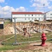 Work to build new foundations for relocated World War II-era barracks under way at Fort McCoy