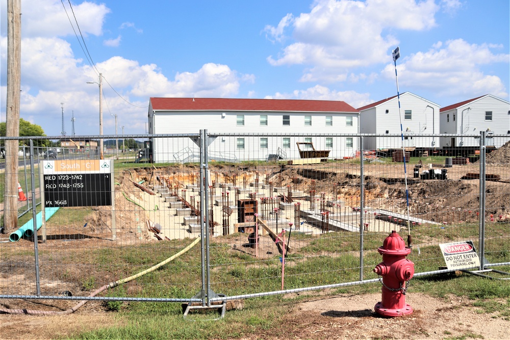 Work to build new foundations for relocated World War II-era barracks under way at Fort McCoy