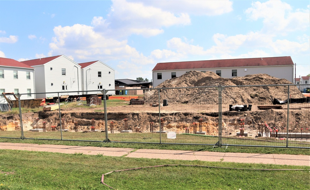 Work to build new foundations for relocated World War II-era barracks under way at Fort McCoy