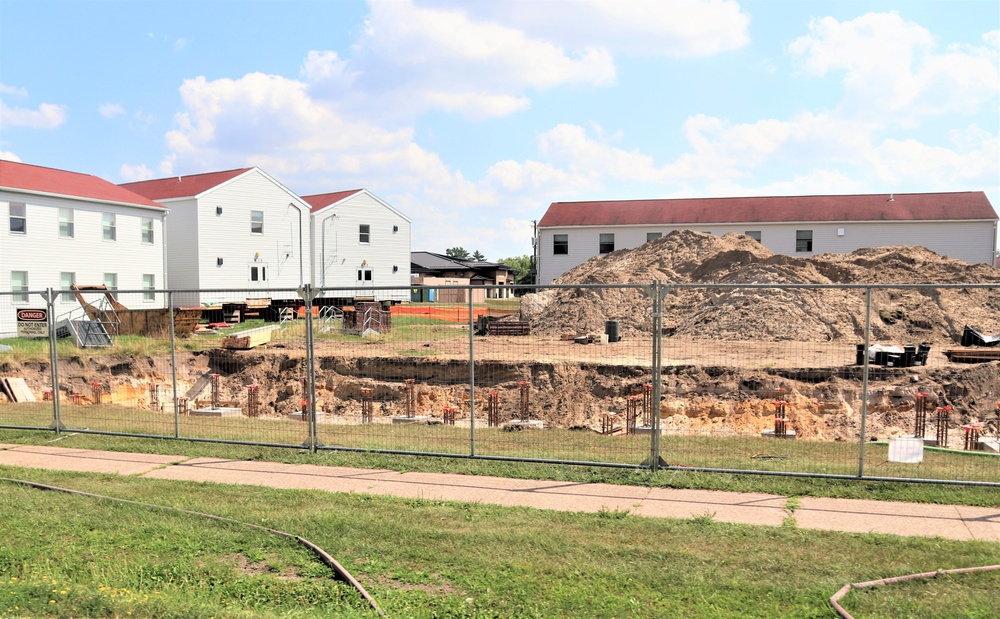 Work to build new foundations for relocated World War II-era barracks under way at Fort McCoy