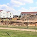 Work to build new foundations for relocated World War II-era barracks under way at Fort McCoy