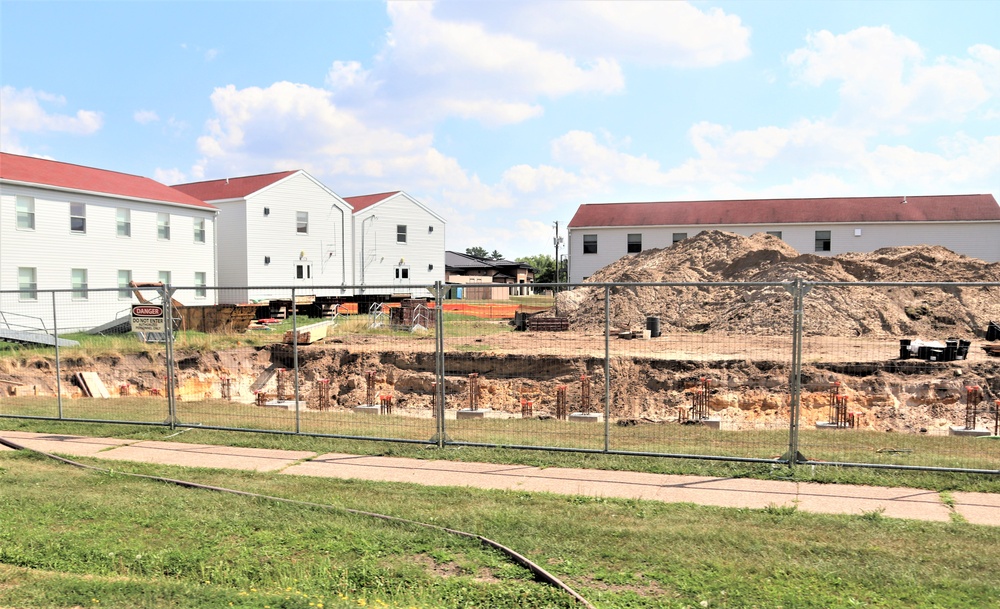 Work to build new foundations for relocated World War II-era barracks under way at Fort McCoy