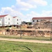 Work to build new foundations for relocated World War II-era barracks under way at Fort McCoy