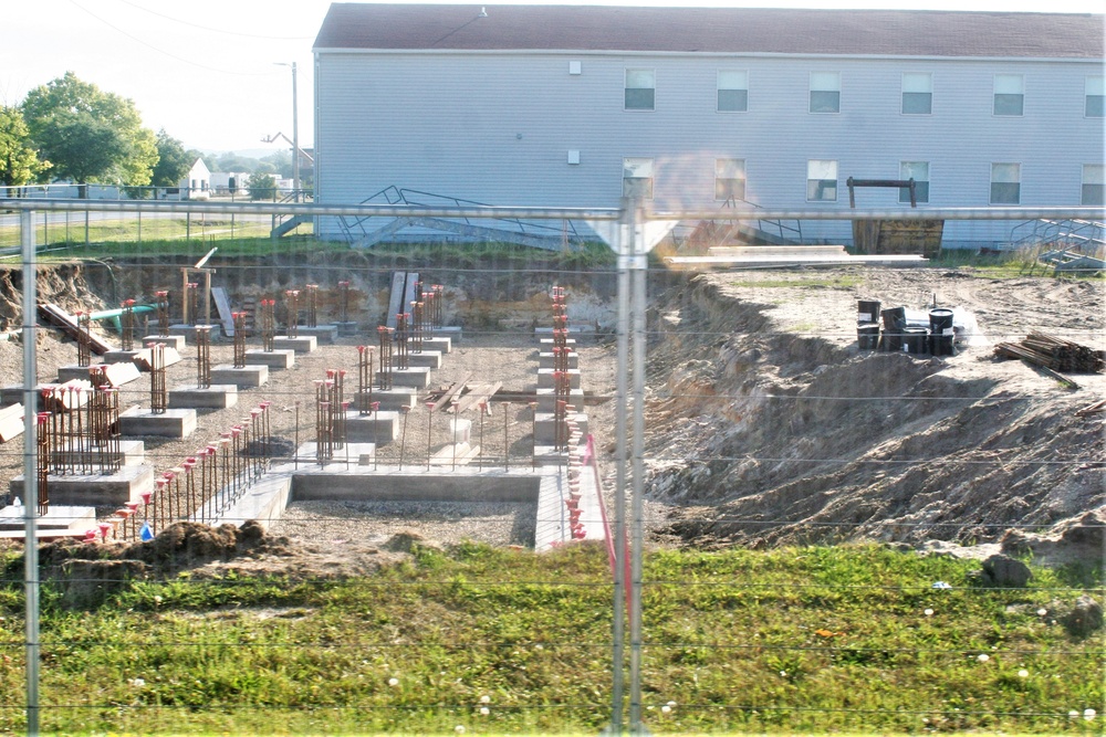 Work to build new foundations for relocated World War II-era barracks under way at Fort McCoy