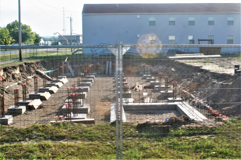 Work to build new foundations for relocated World War II-era barracks under way at Fort McCoy