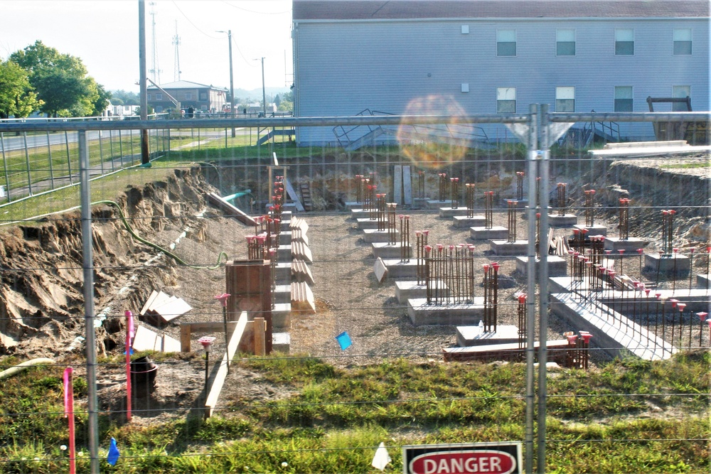 Work to build new foundations for relocated World War II-era barracks under way at Fort McCoy