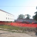 Work to build new foundations for relocated World War II-era barracks under way at Fort McCoy