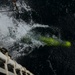 U.S. Navy launches an unmanned undersea vehicle from a Coast Guard Cutter in support of Op Nanook