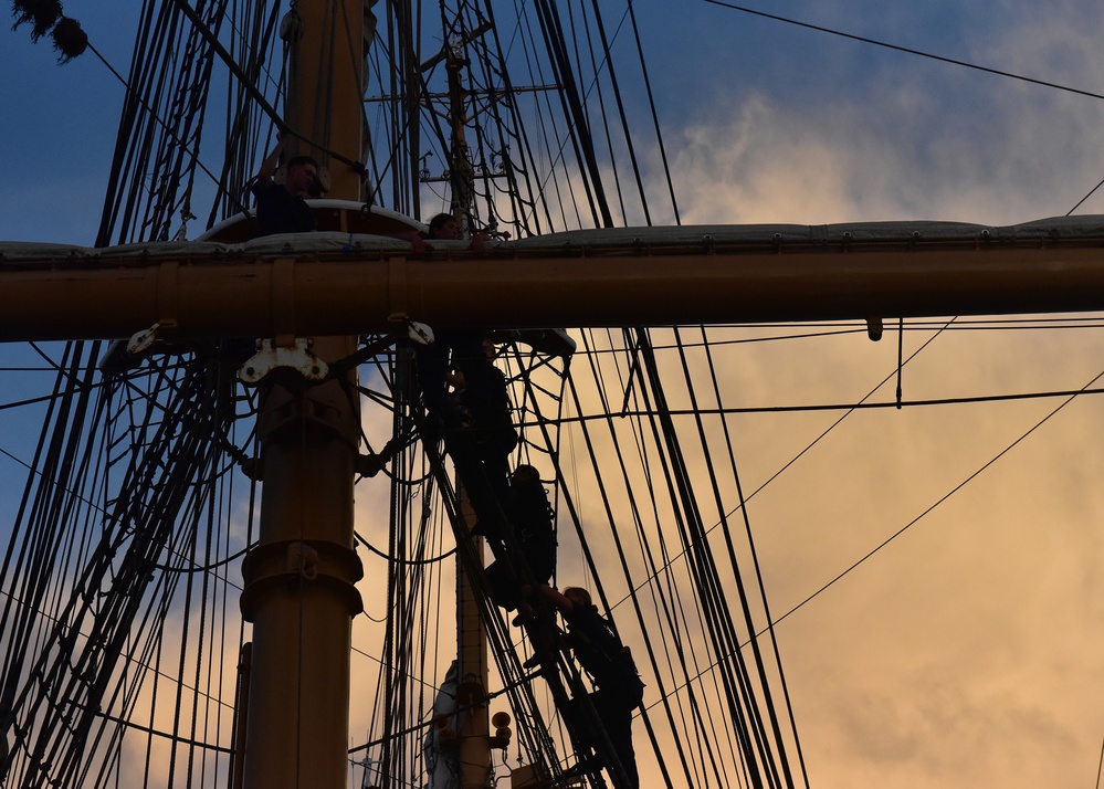 Crewmembers conduct twilight climb aboard Coast Guard Cutter Eagle