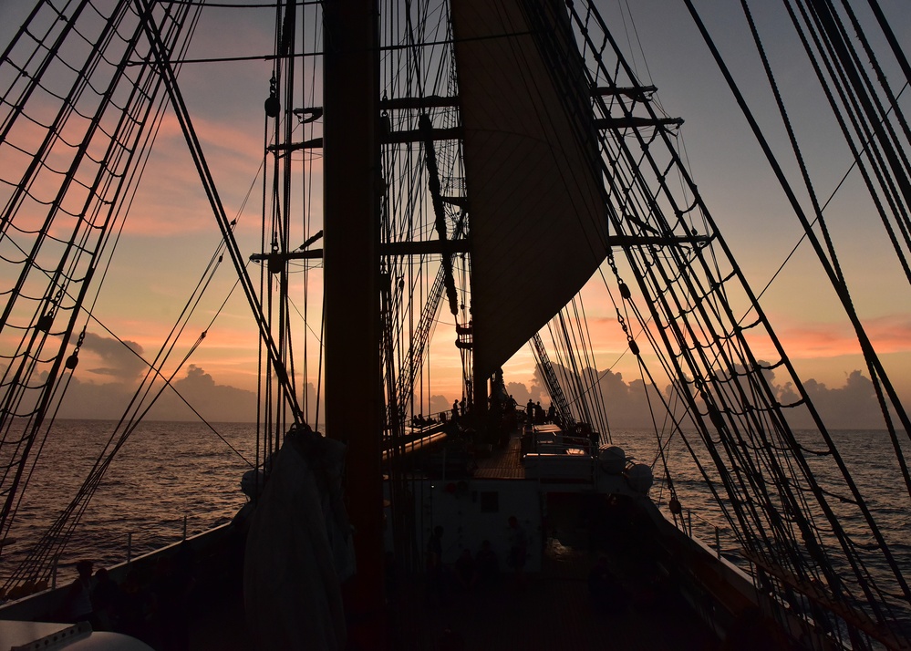 Crewmembers conduct twilight climb aboard Coast Guard Cutter Eagle
