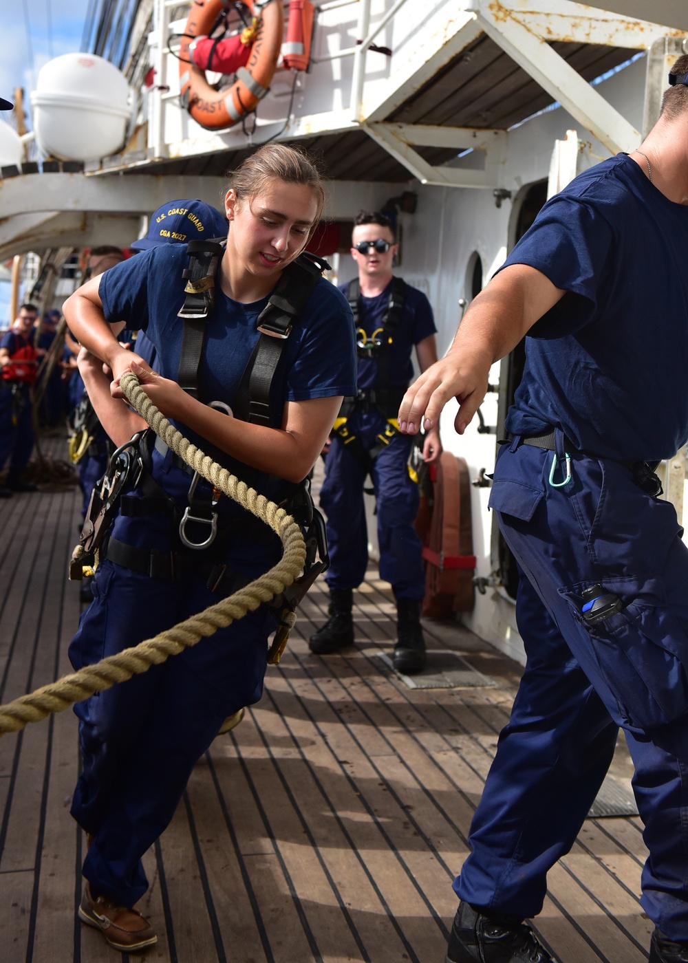 Heave! Swabs handle lines aboard CGC Eagle