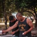 Dinner is Served: Marines enjoy a Mid-week meal with Peleliu Community