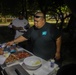 Dinner is Served: Marines enjoy a Mid-week meal with Peleliu Community