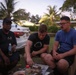 Dinner is Served: Marines enjoy a Mid-week meal with Peleliu Community