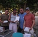 Dinner is Served: Marines enjoy a Mid-week meal with Peleliu Community