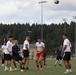 Kicking it: Soldiers play soccer