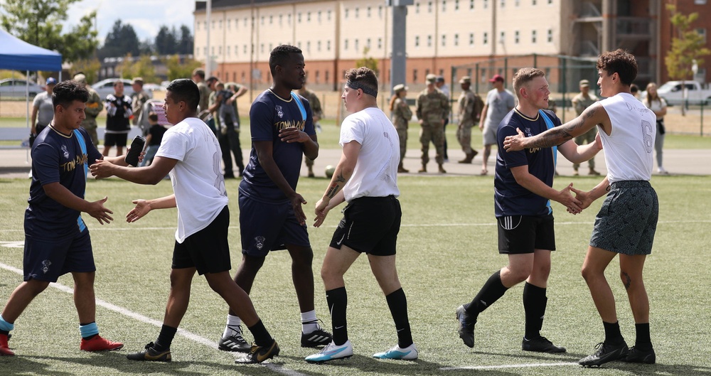 Kicking it: Soldiers play soccer