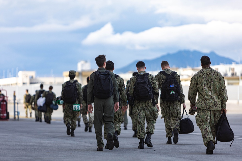 Home at last: U.S. Sailors with VAW-125 return to Marine Air Station Iwakuni Japan