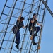 Crewmembers climb the rig, tend sail aboard America's Tall Ship, Coast Guard Cutter Eagle