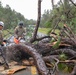 Florida National Guard soldiers clear road debris left in the wake of Hurricane Idalia