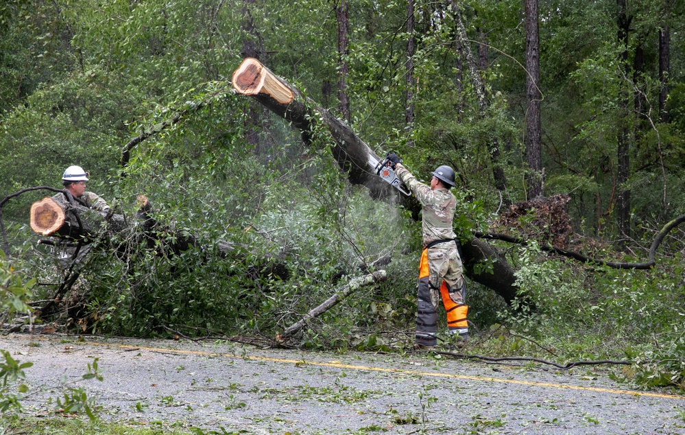 Florida National Guard Soldiers clear road debris left in Hurricane Idalia's wake