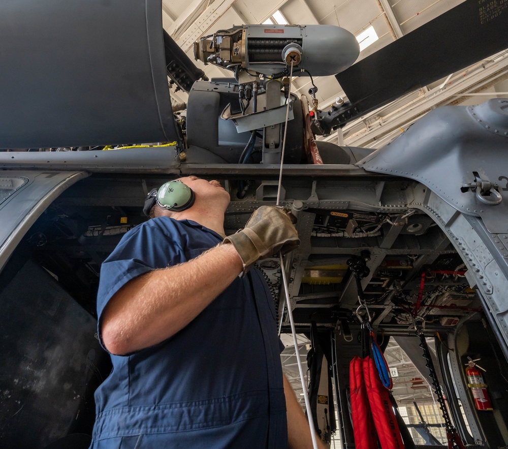 Hoist is removed from an HH-60G Pave Hawk helicopter