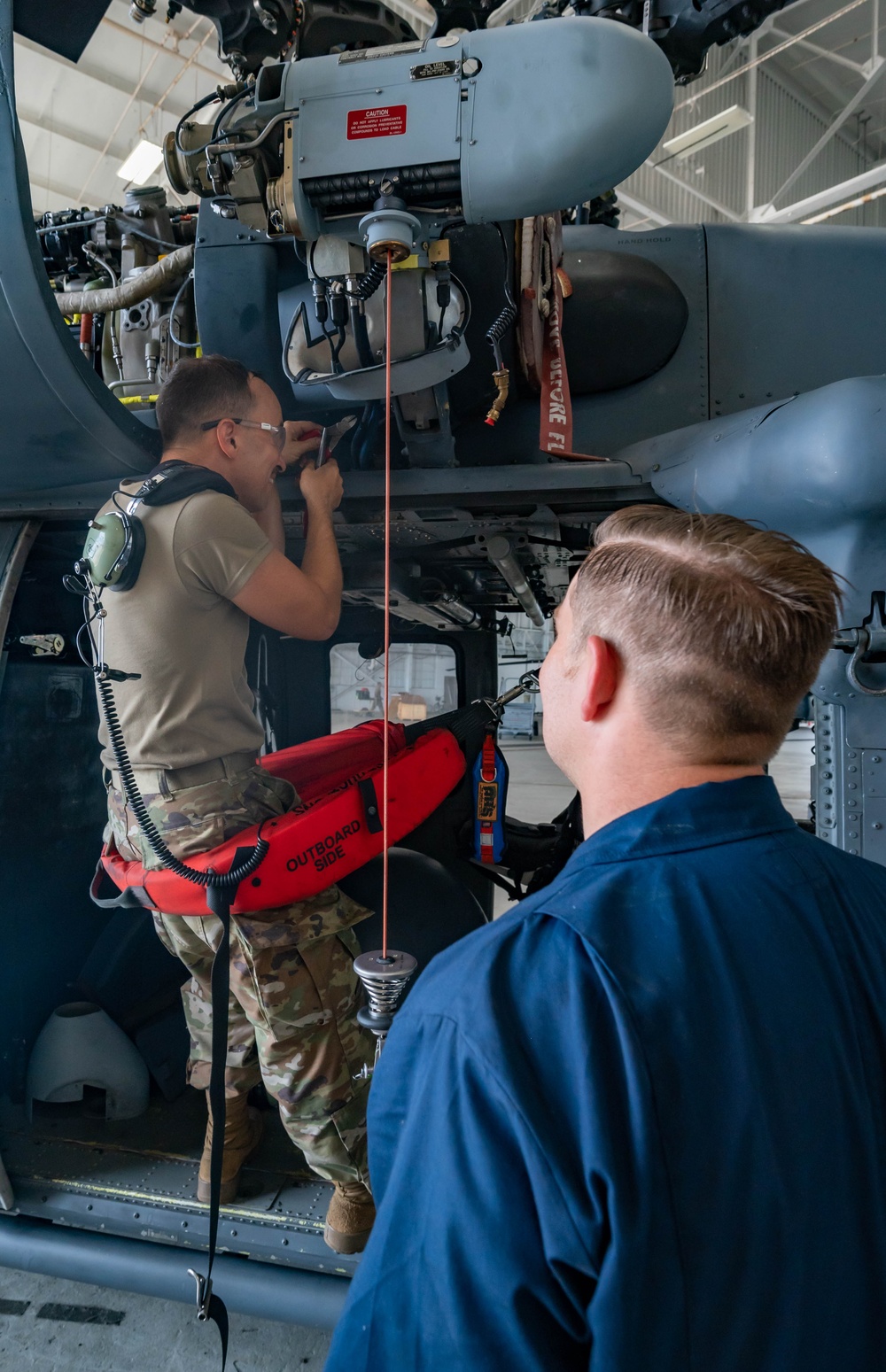 Hoist is removed from an HH-60G Pave Hawk helicopter