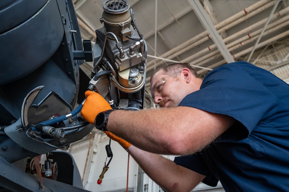 Hoist is removed from an HH-60G Pave Hawk helicopter