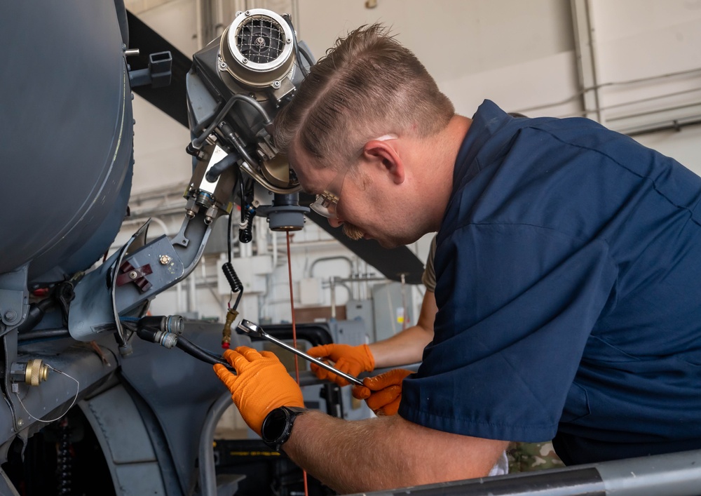 Hoist is removed from an HH-60G Pave Hawk helicopter